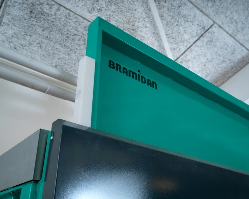 vertical opening door with Bramidan logo