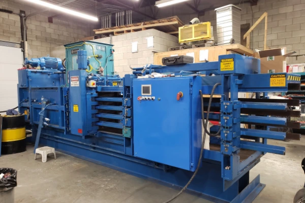 blue reconditioned baler in warehouse
