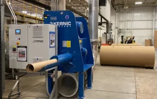 core shredder with jumbo roll in background