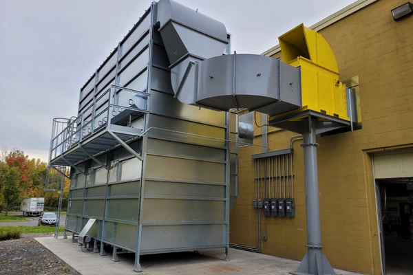 silver dust collector side view with yellow abort gate