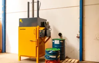yellow drum crusher with empty drums
